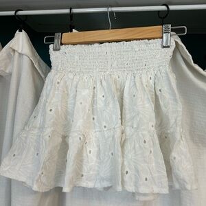 White floral mini skirt, size M (fits like a Small)